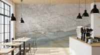 Gray veined stone mural behind a coffee bar with espresso machine and high tables GD14215
