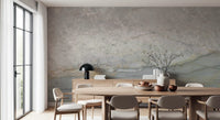 Marble wallpaper behind a round oak dining table with gray chairs and a sideboard GD14215
