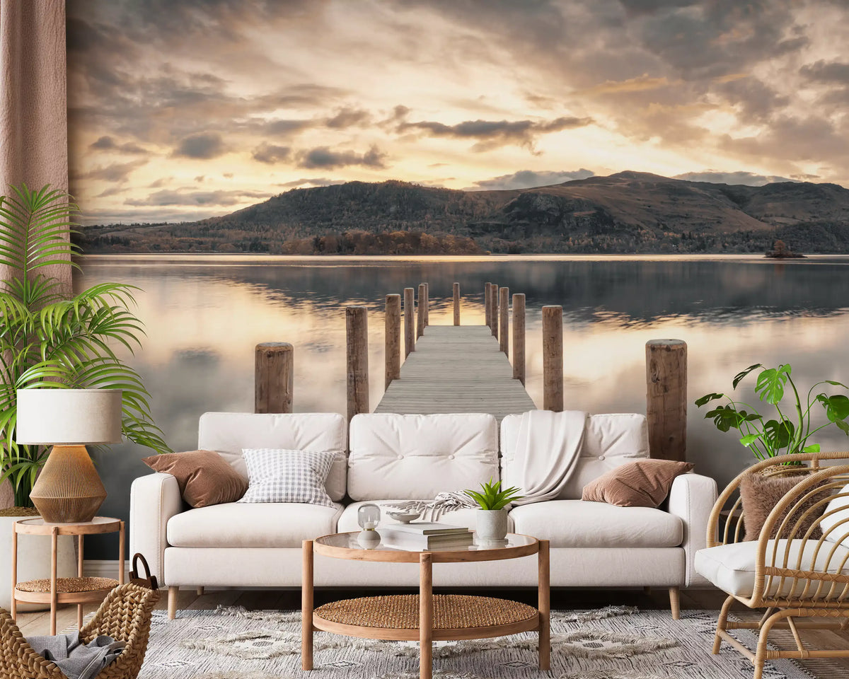 White sofa, rattan armchair and round wood coffee table in front of a lake and hills mural GD14220