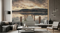 Dark gray sectional, black floor lamp and glass pendants in front of lake wallpaper GD14220