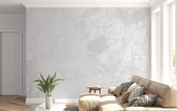 Wandvullende muurschildering met minimalistische witte marmertextuur