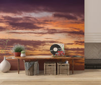 Wandbild mit feurigem Sonnenuntergang am Horizont