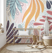 Artistic wallpaper mural featuring a mix of colorful leaves.
