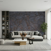 An artistic ancient stone mural on minimalist wallpaper.

