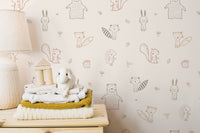Sweet forest animals wallpaper for a cozy kids' space.
