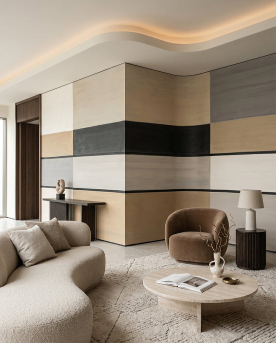 Living room set against the Agnes Field horizontal stripe wall mural in warm neutrals.