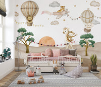 Safari nursery wallpaper with hot air balloons and airplanes
