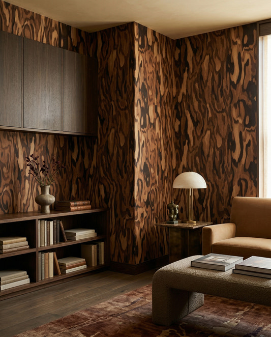 Warm brown burl grain of the Ettore Walnut wall mural settles a quiet Living room.