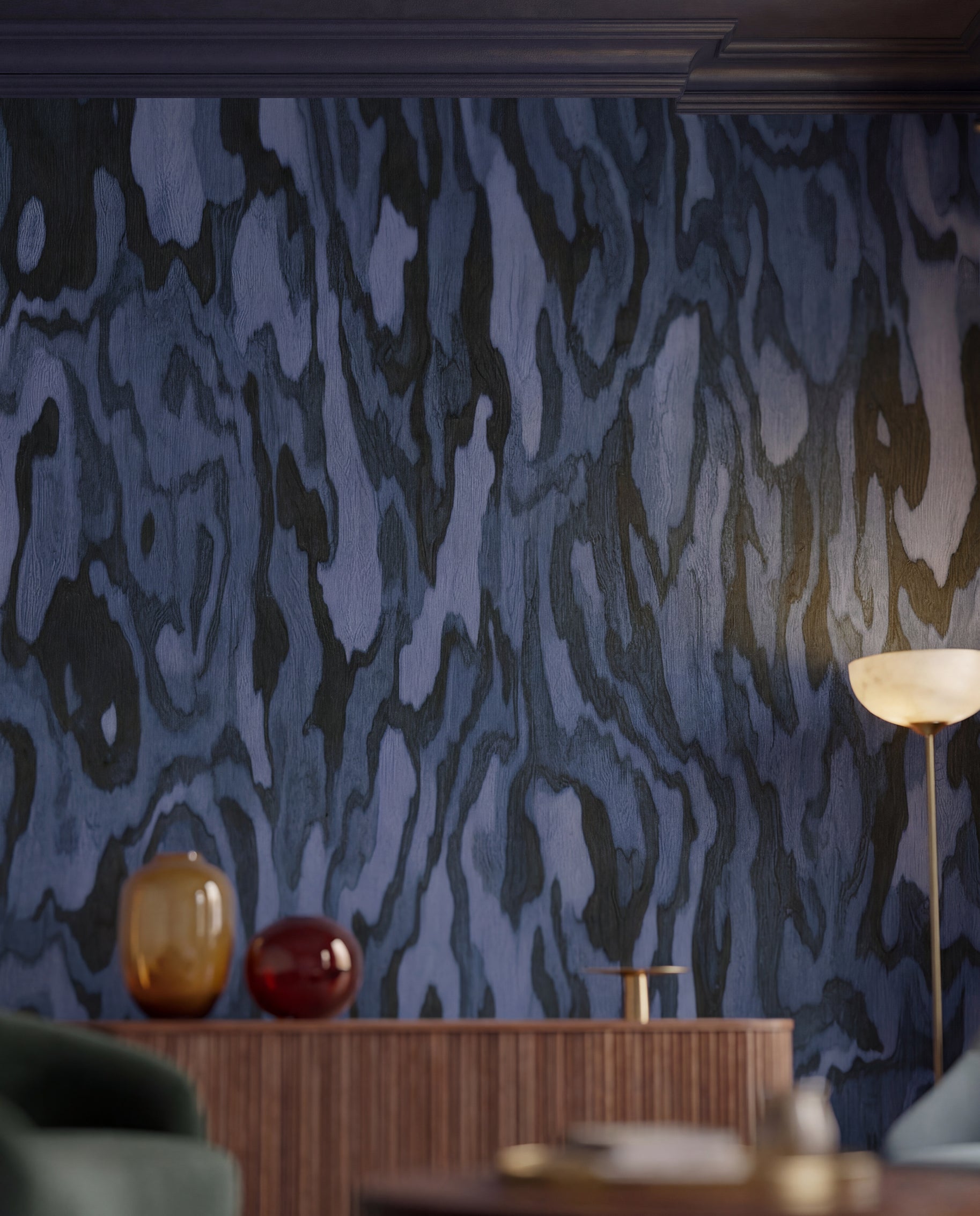 Hallway styling deepens with ripples of the Ettore Burl wall mural in navy.