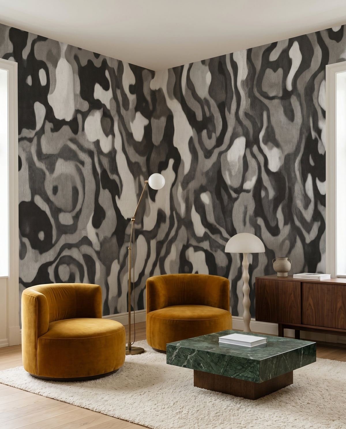 Charcoal Ettore Line wall mural flowing behind the living room area
