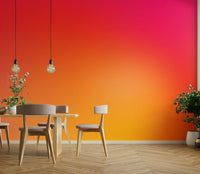Bold pink to orange gradient mural wallpaper for modern rooms.


