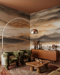 Mist drifts over ridge layers in a calm lounge showing the Silence wall mural.
