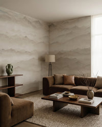 Drifting fog flows between layered ridgelines on the Roerich Peaks wall mural.