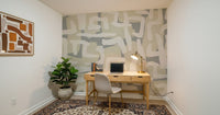 Abstract terrain mural on dining feature wall, muted colors