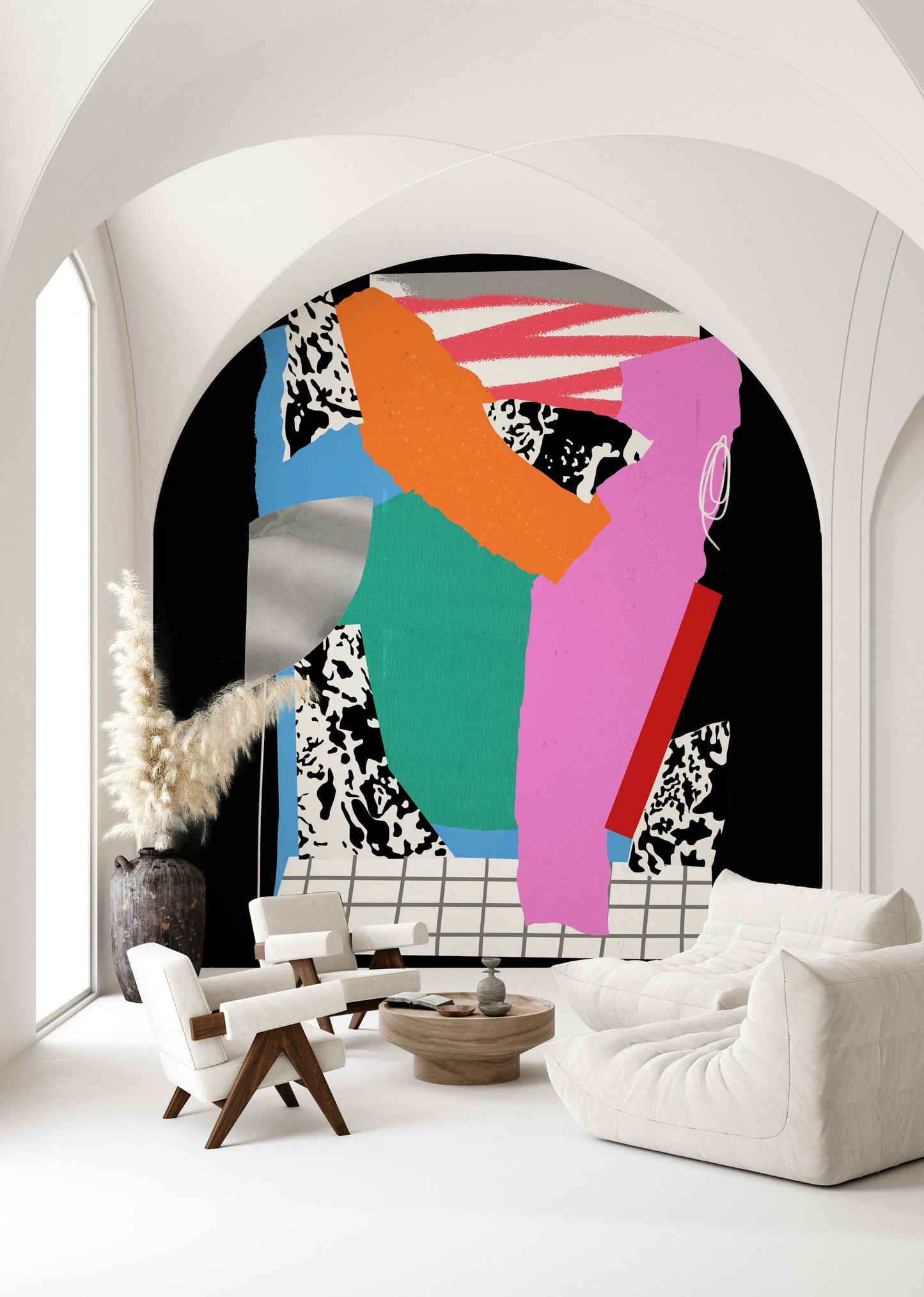 Contemporary wall mural with earthy hues in a bright studio apartment.