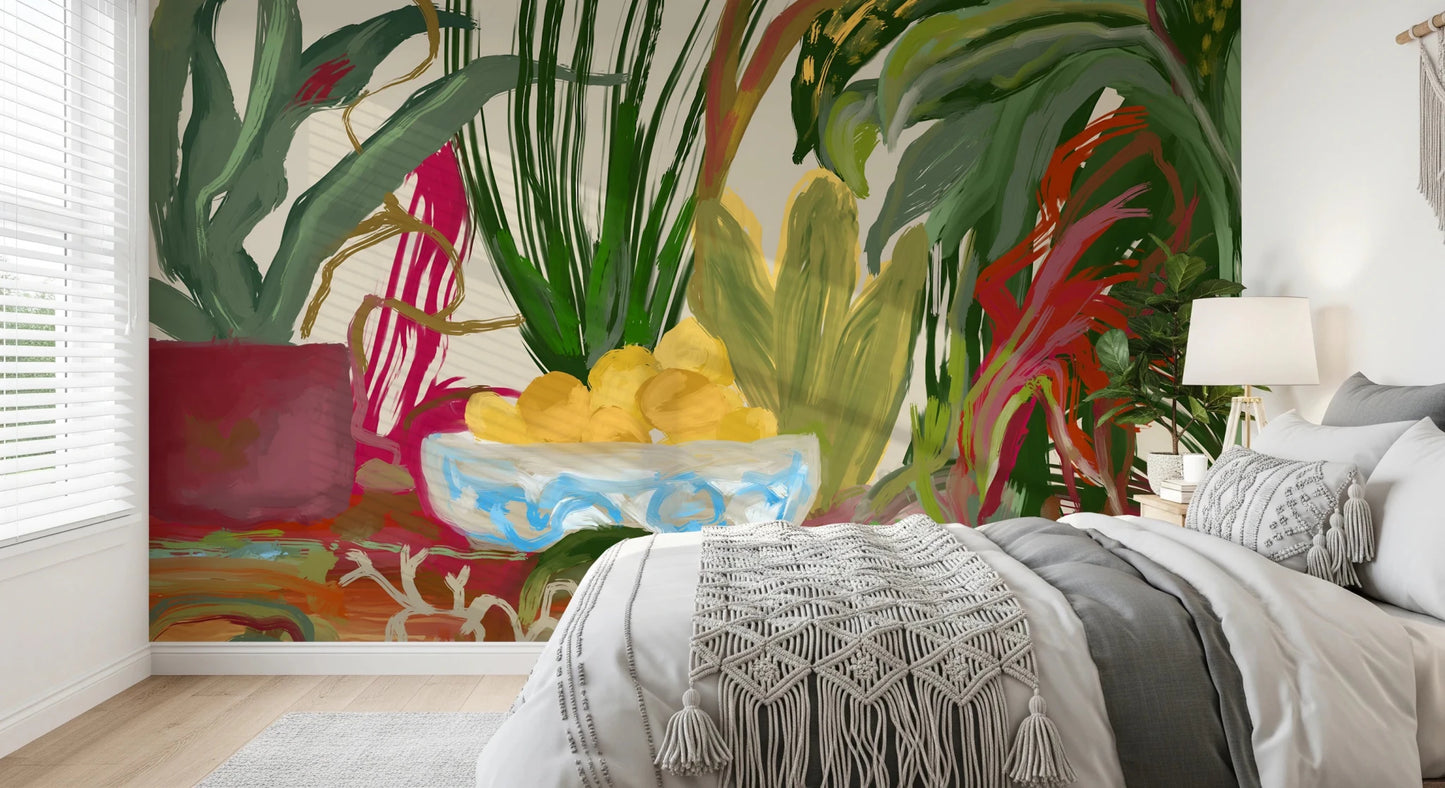 Green leaves surround a bowl of fruit on this bedroom Abstract Eden Botanical wall mural.