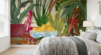Green leaves surround a bowl of fruit on this bedroom Abstract Eden Botanical wall mural.