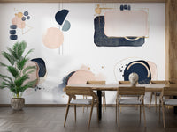 Navy blue geometric wallpaper with soft pink elements.