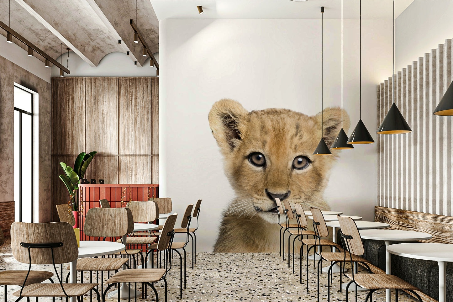 Jungle animal mural featuring baby lion cub

