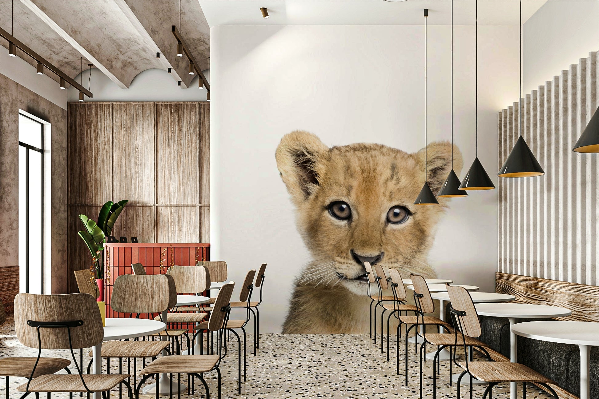 Jungle animal mural featuring baby lion cub

