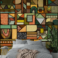 Bold and vibrant Afrika mural with elephant silhouettes and desert scenery.

