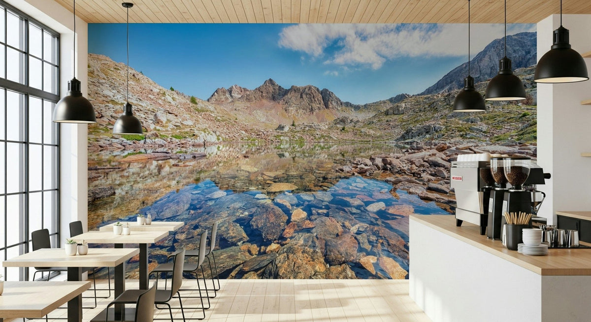 Alpine Serenity wallpaper mural of a rocky mountain lake behind small cafe tables and an espresso counter