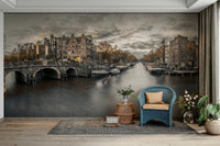 Sepia-toned Amsterdam mural with glowing windows

