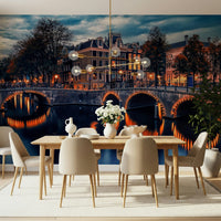 Amsterdam Nights mural featuring glowing arched bridge reflections.