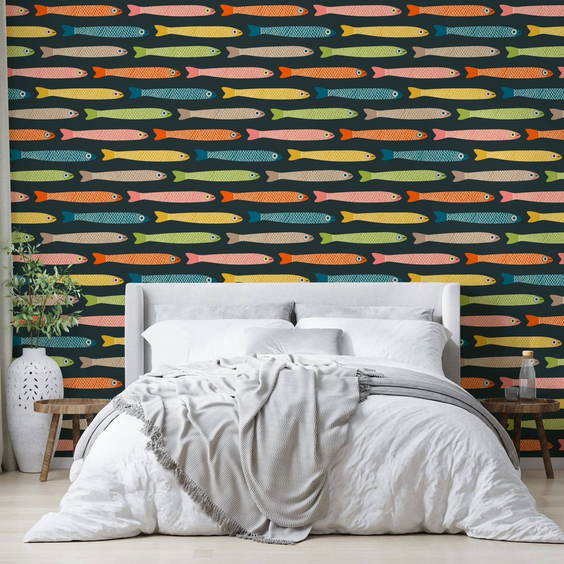 Playful fish design in multicolors on a charcoal background.

