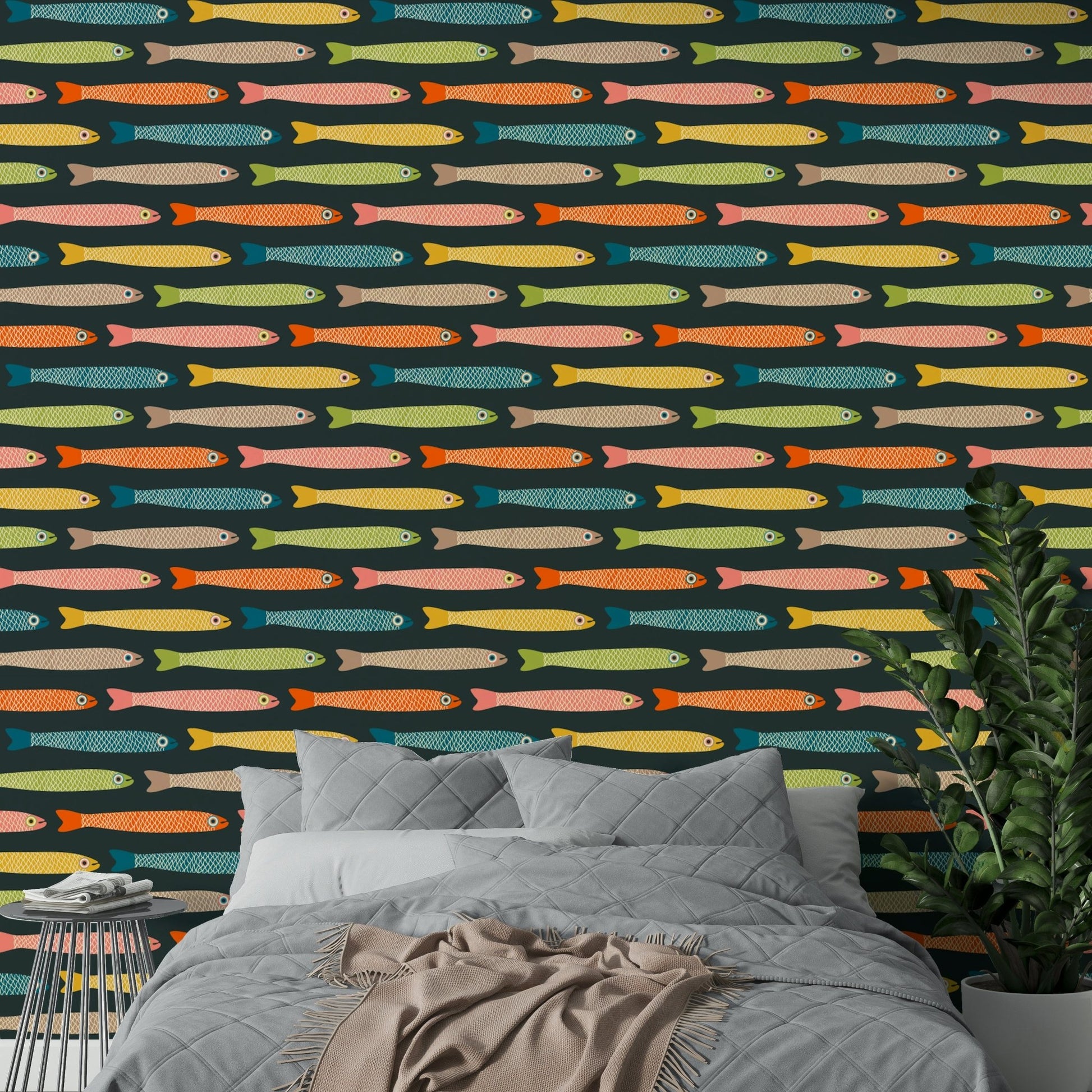 Multicolored anchovies on a charcoal background for fun decor.

