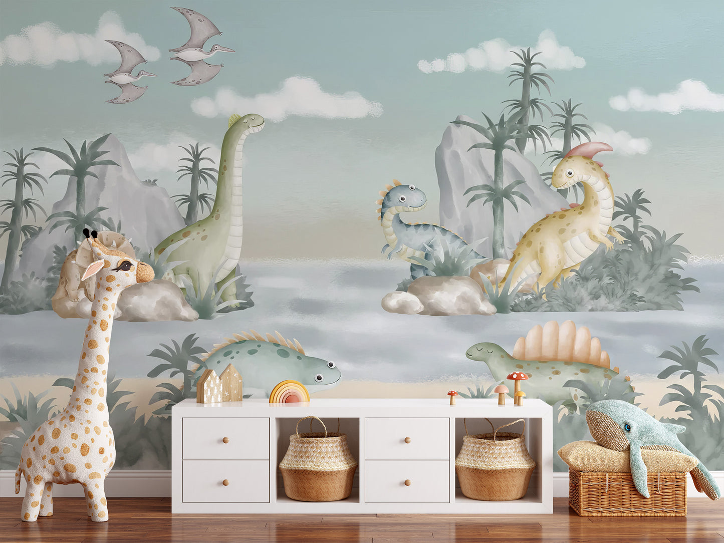 Temporary Ancient Adventures nursery mural in a nursery with white storage bins and a large giraffe plush toy.