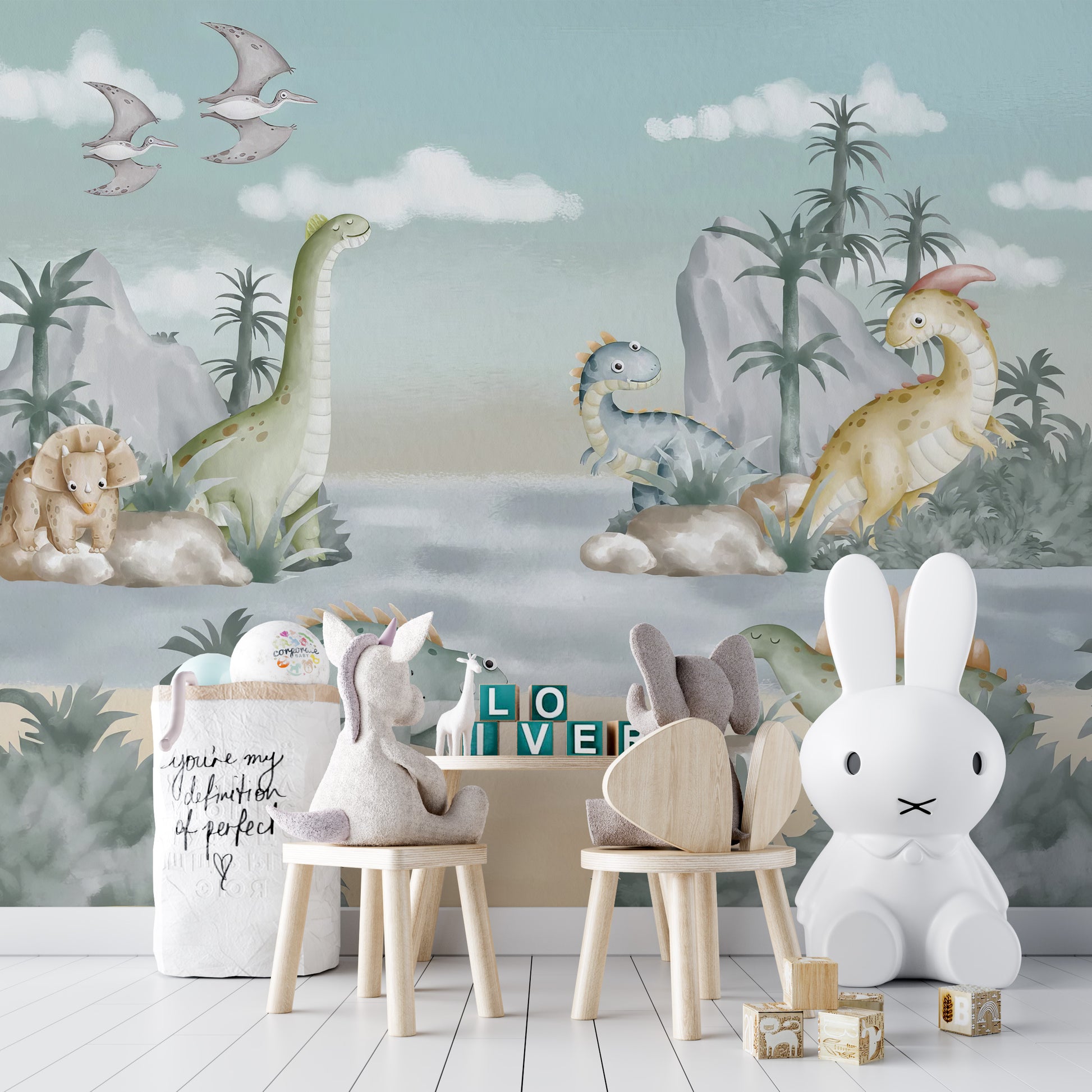Playroom with Ancient Adventures dinosaur mural on canvas featuring white bunny chairs and a large bunny plush.