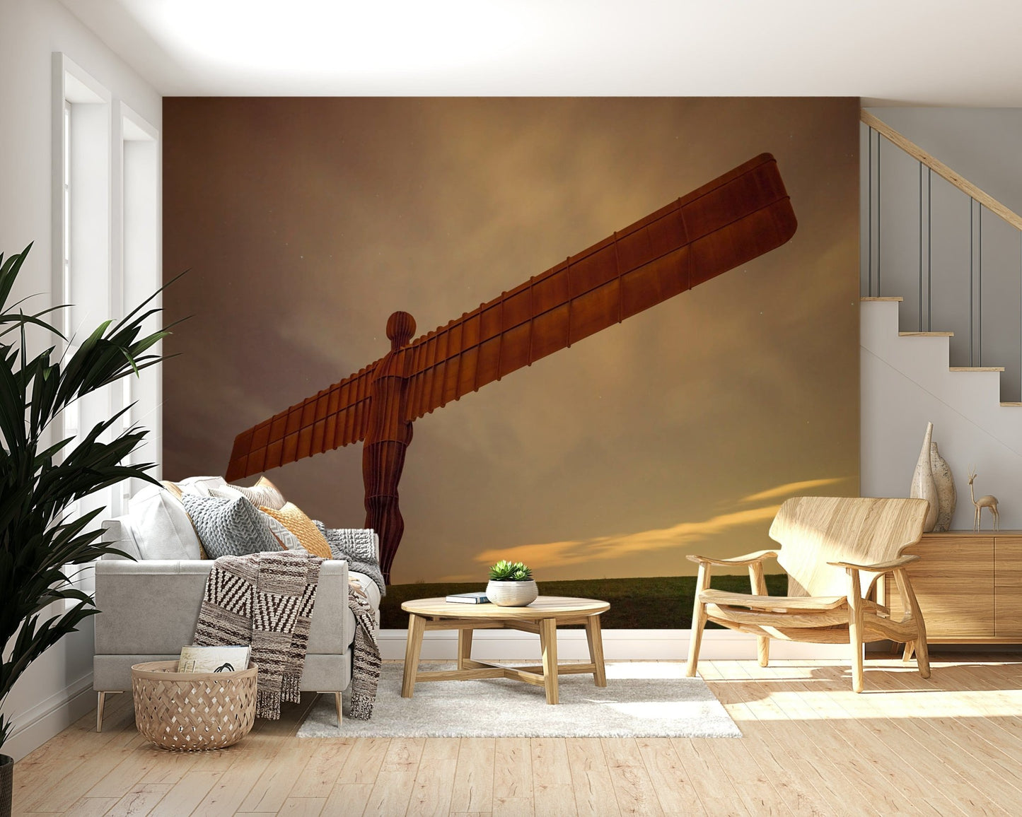 Striking Angel monument wallpaper, massive outstretched wings, glowing night sky.