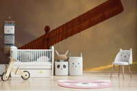 Celebrated Angel structure wall mural, dramatic sky, landmark artwork.