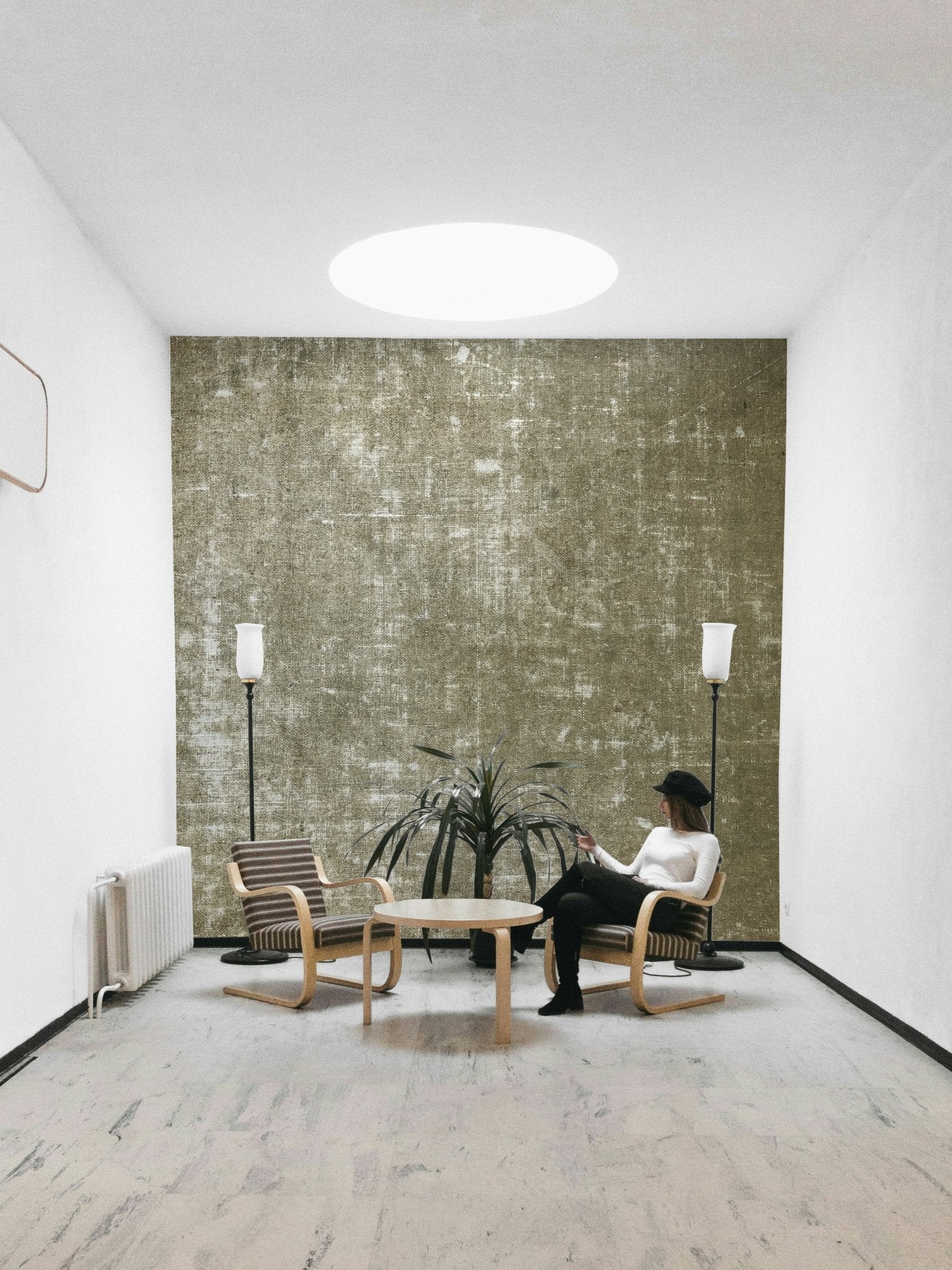 Muted green-brown mural wallpaper
