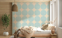 Modern geometric wallpaper with oversized aqua dots arranged in a clean repeating grid