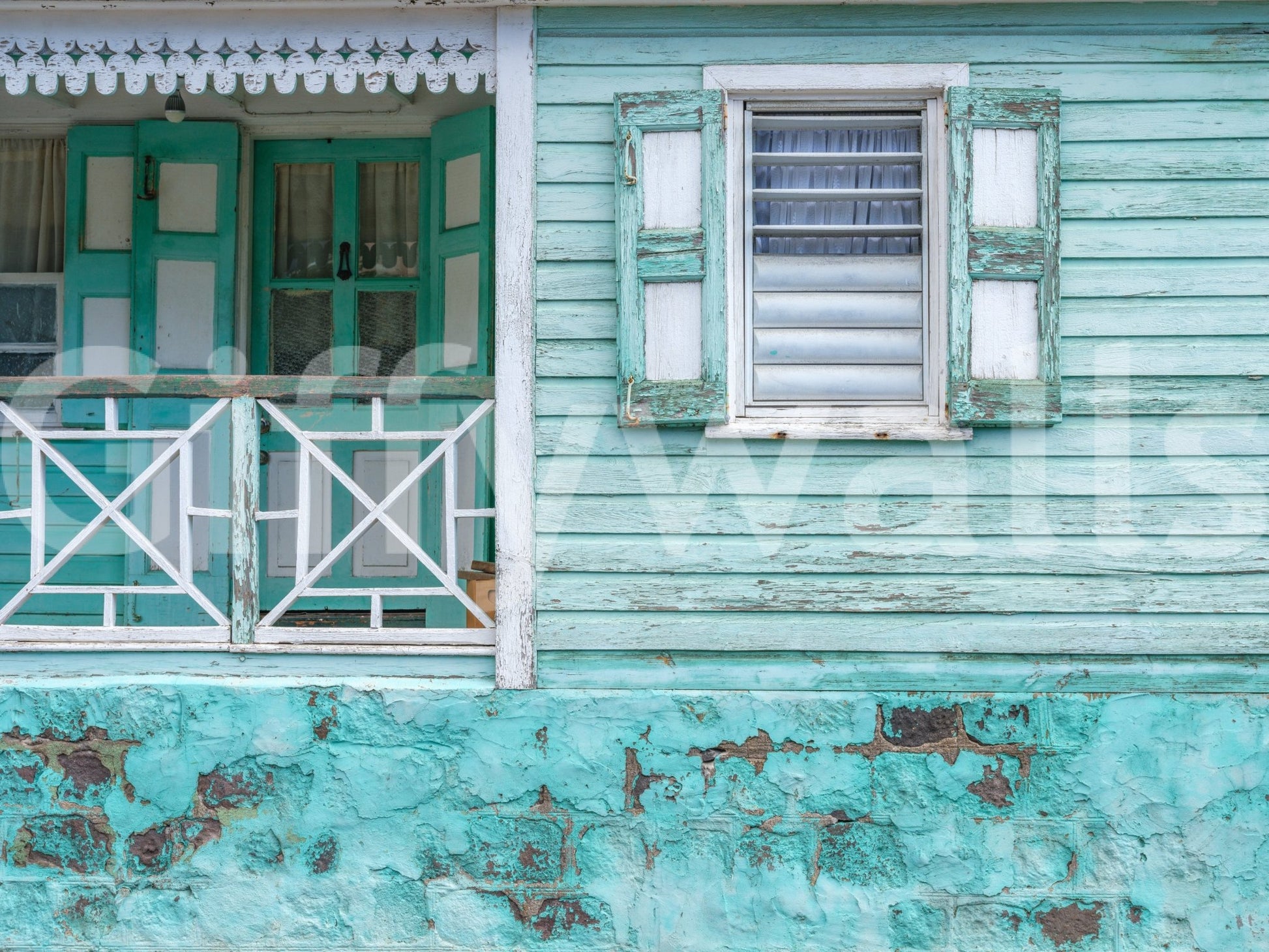 Distressed paint texture wallpaper in coastal tones.

