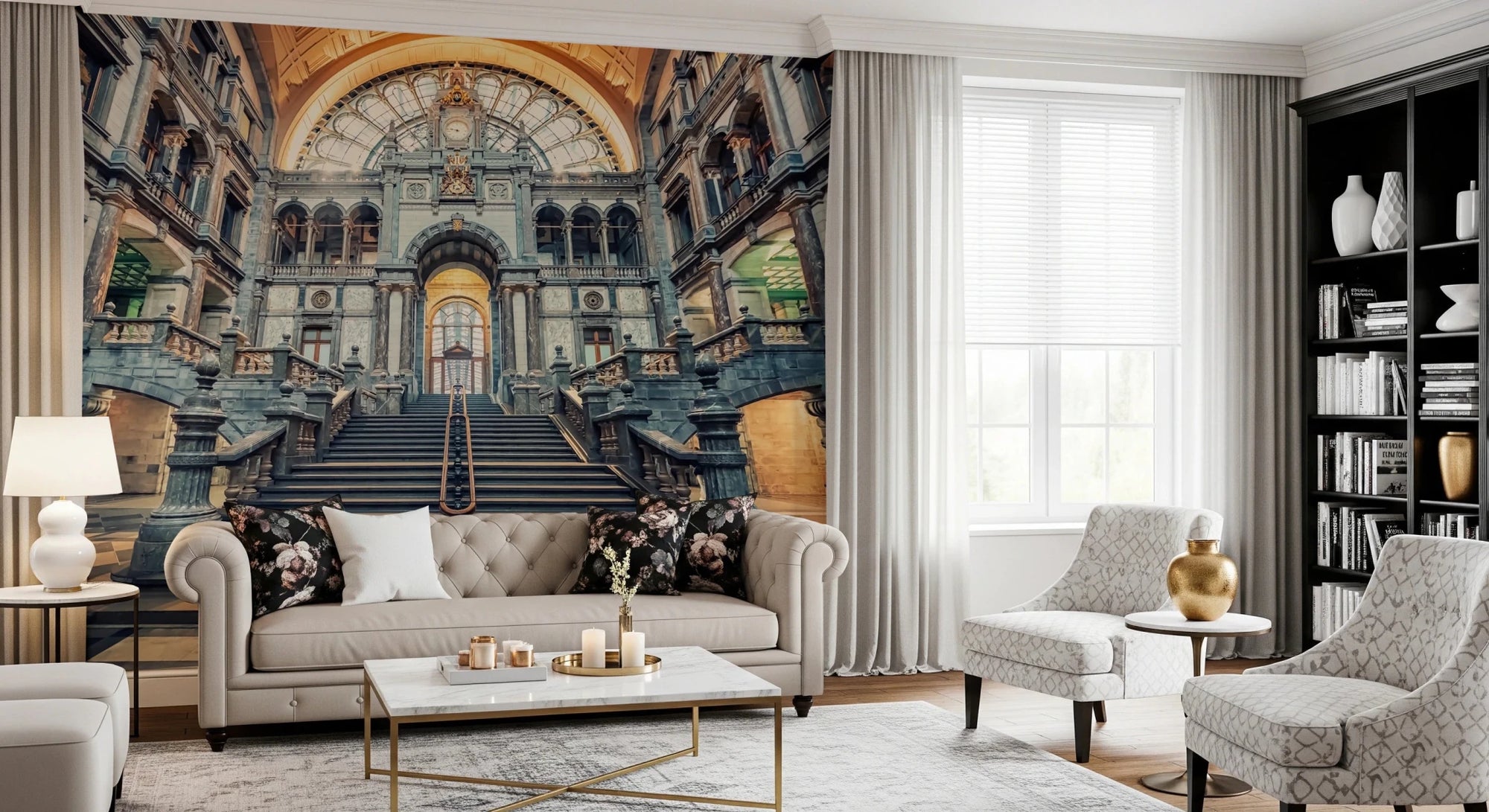 Architectural Majesty mural of a grand stone staircase hall behind a beige tufted Chesterfield sofa