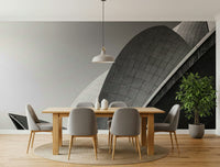 Decorative mural featuring geometric structures adorned with soft, flowing petals.