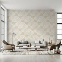 Art Deco Botanical Palm Fan Soft White Beige wallpaper behind a grey sofa and beige armchairs in a living room