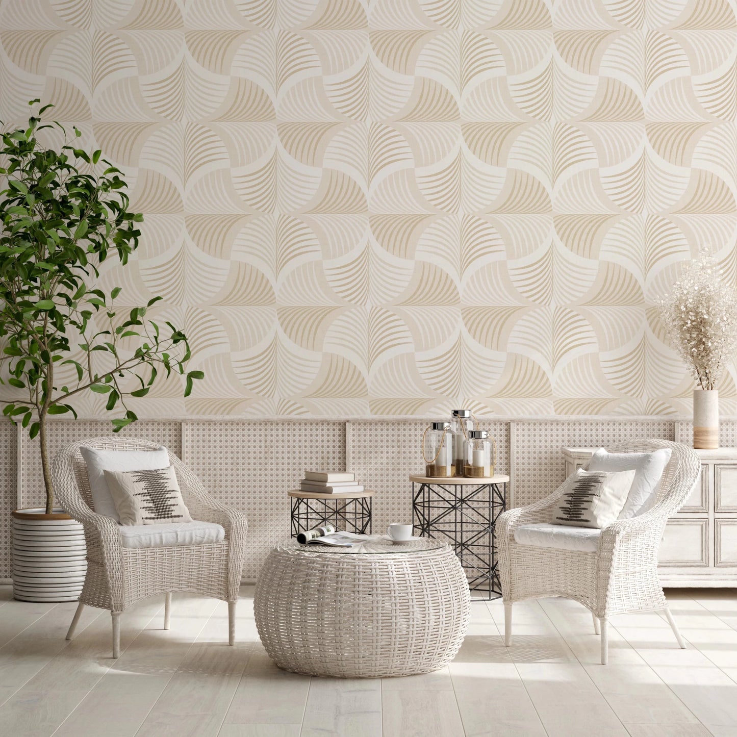 Art Deco Botanical Palm Fan Soft White Beige wallpaper behind white wicker chairs and a woven pouf table