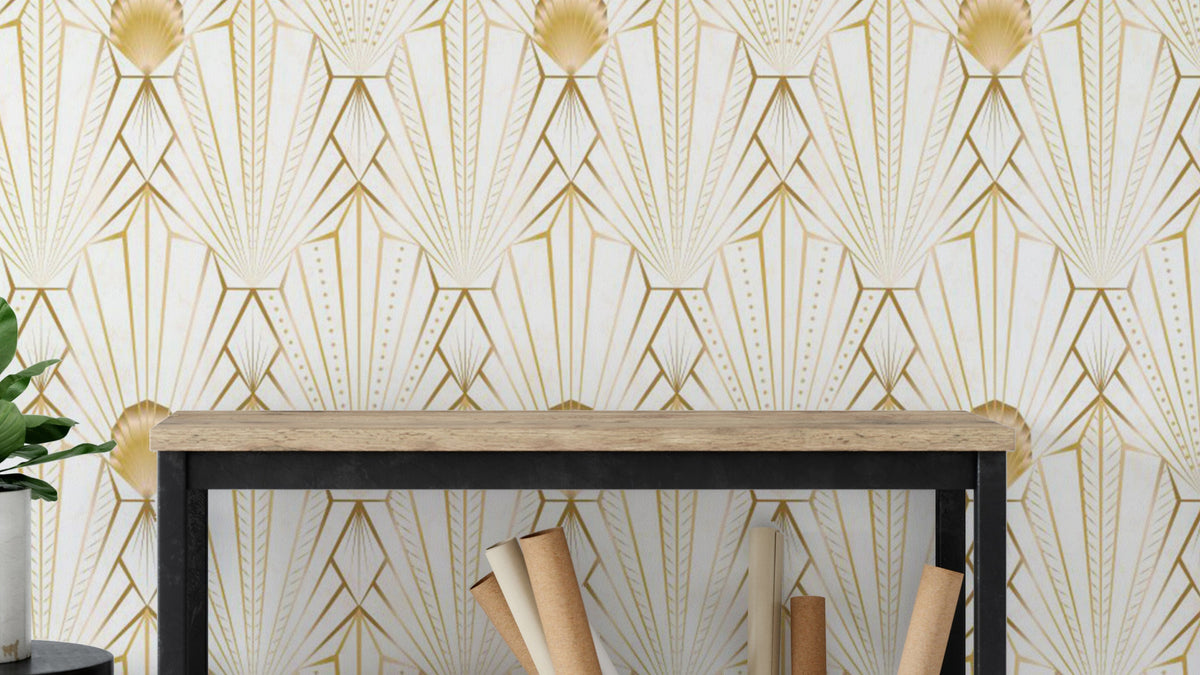 Art Deco Gold Radiance wallpaper in cream and gold fans above a wood console holding rolled wallpaper rolls