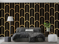 Black background mural with gold curved column outlines.

