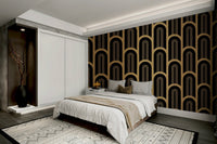 Geometric pattern mural with gold arch designs on black.

