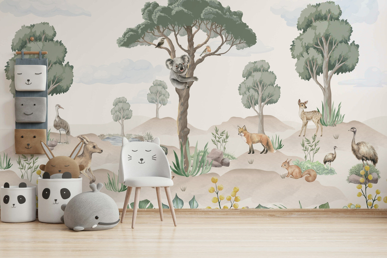 A nursery decorated with a wildlife mural

