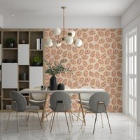 Autumn Leaves Wallpaper – Soft, serene wall design showcasing leaves in blush, gold, and orange hues.