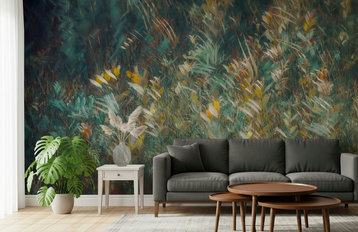 Autumnal Whisper wallpaper mural of a teal meadow with golden grasses behind a charcoal sofa and monstera plant