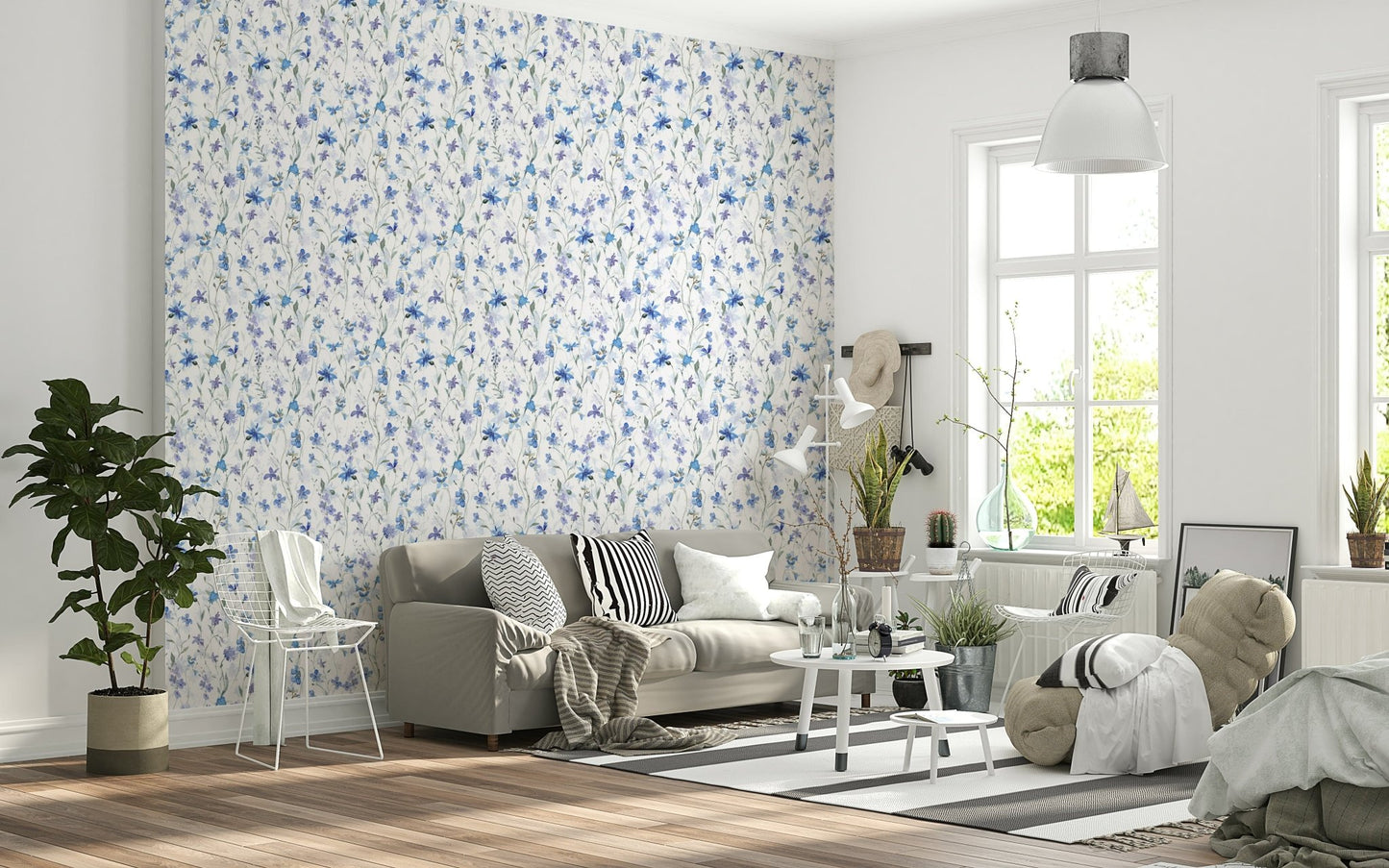Soft blue botanical wallpaper in an apartment bedroom with neutral bedding.