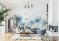 Dreamy Dandelion Seeds Wall Mural – Peaceful wall art with floating white dandelions over a misty blue backdrop.