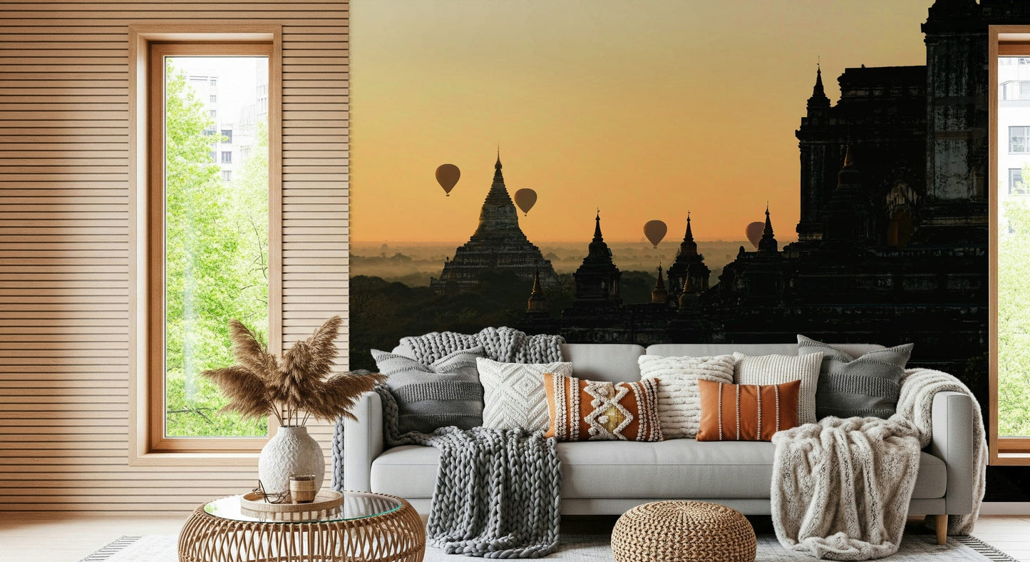 Scenic Bagan Sunrise Wall Mural – Vibrant morning sky with floating balloons above historic temple landscapes.